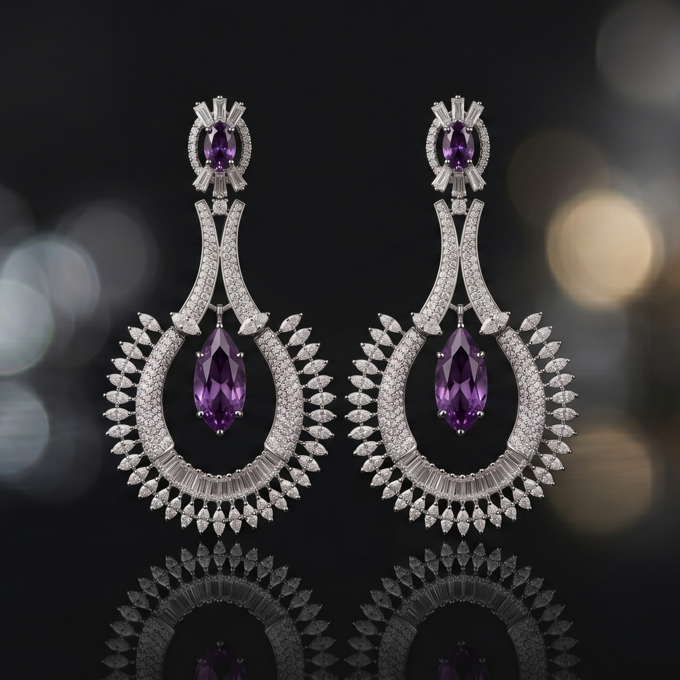 Pair of silver earrings with purple gemstones on a dark background