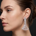 Close-up of a woman wearing a sparkling earring against a dark background