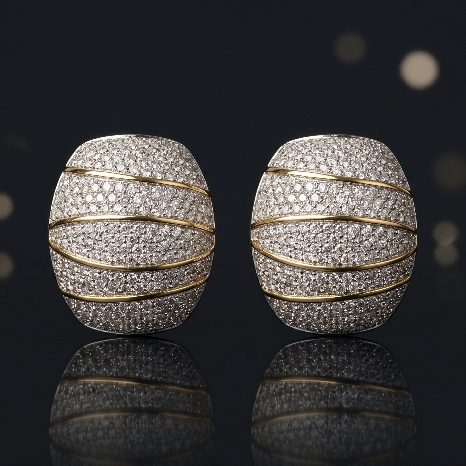 Pair of diamond earrings on a reflective surface with blurred lights in the background