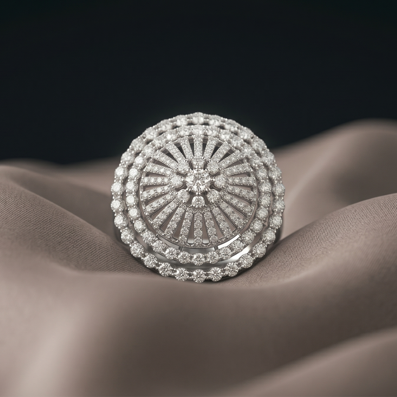 Silver ring with a sunburst design on a textured brown surface