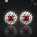 Pair of earrings with red gemstones and diamond-like stones on a dark background