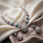 Silver jewelry set with colorful gemstones on a beige fabric background